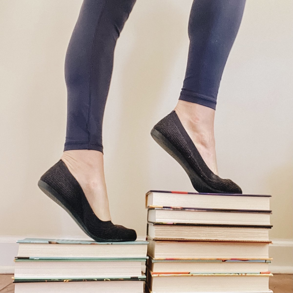 walking on books in Allbirds Womens Tree Breezers.