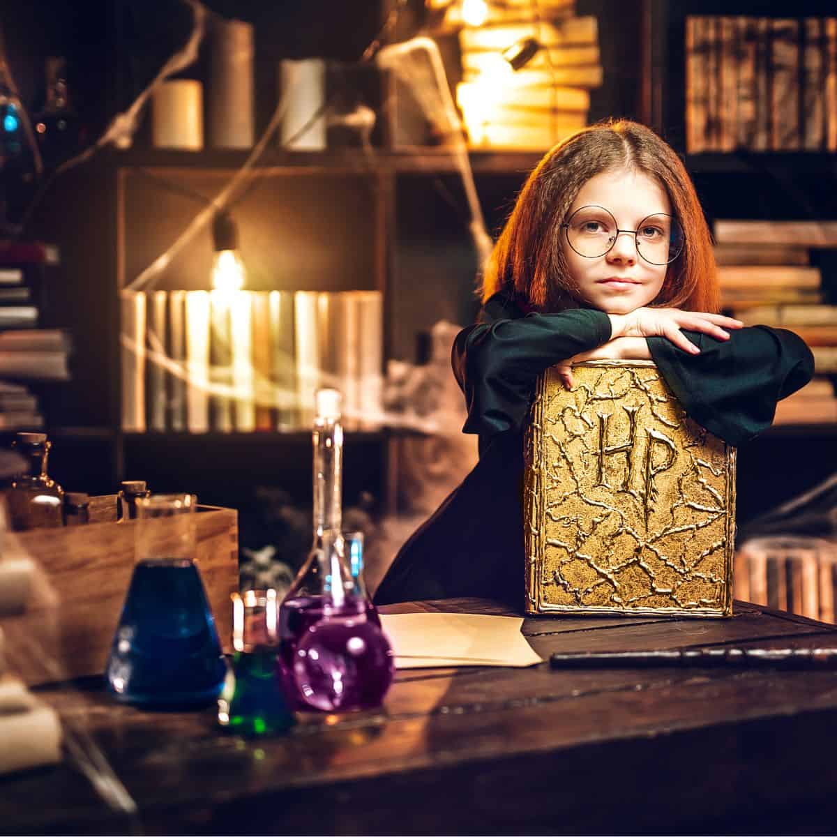 girl in wizard classroom with harry potter books