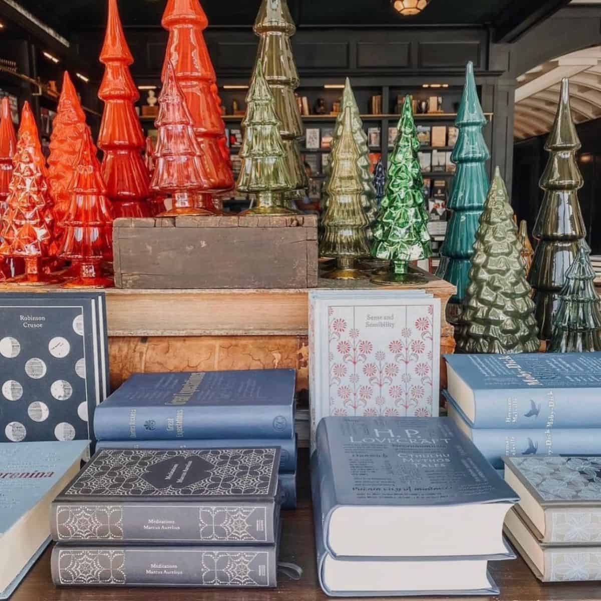 christmas trees and classic books in a bookstore.