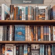 books by stephen king on bookshelves.