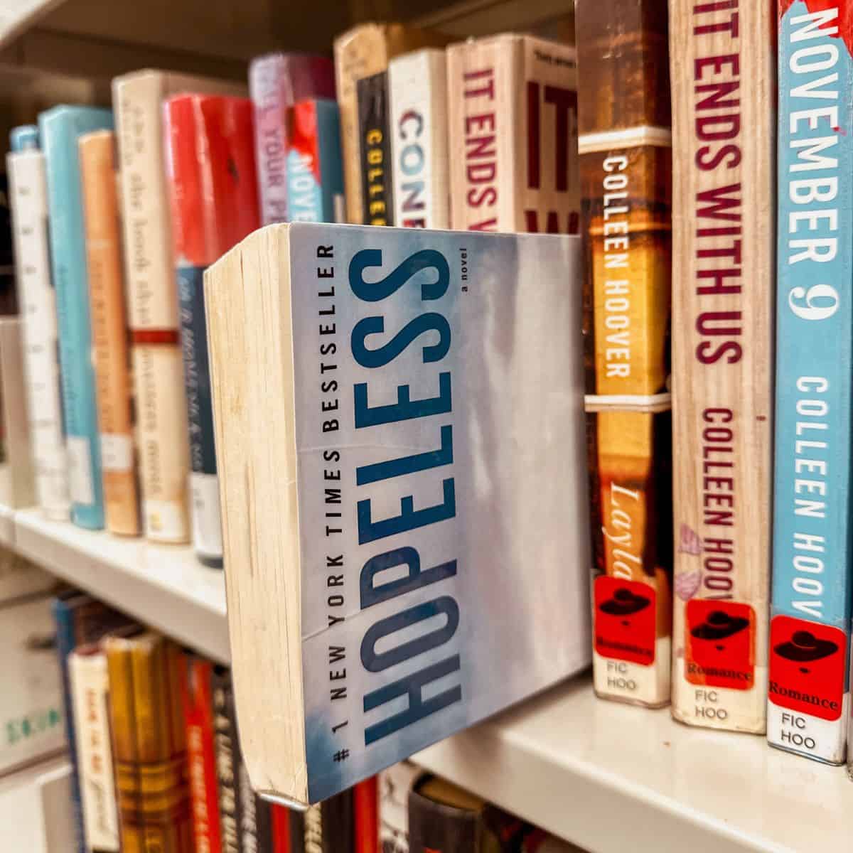 hopeless by colleen hoover on bookshelf with colleen hoover books.