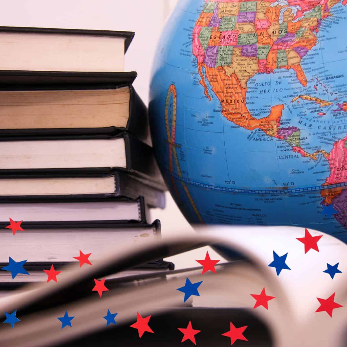 globe showing USA with stack of books.