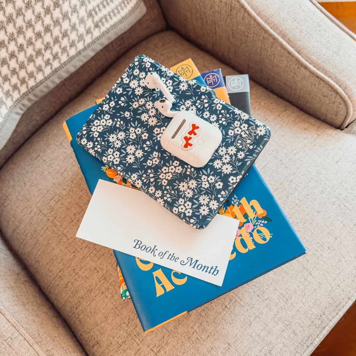 collection of my favorite book subscription types on a chair.